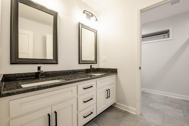 bathroom featuring vanity and tile patterned floors