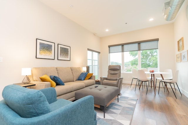 living room with light hardwood / wood-style floors