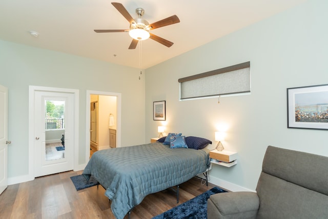 bedroom with hardwood / wood-style flooring, ceiling fan, and connected bathroom