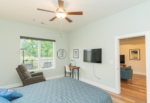 bedroom featuring ceiling fan and light wood-type flooring