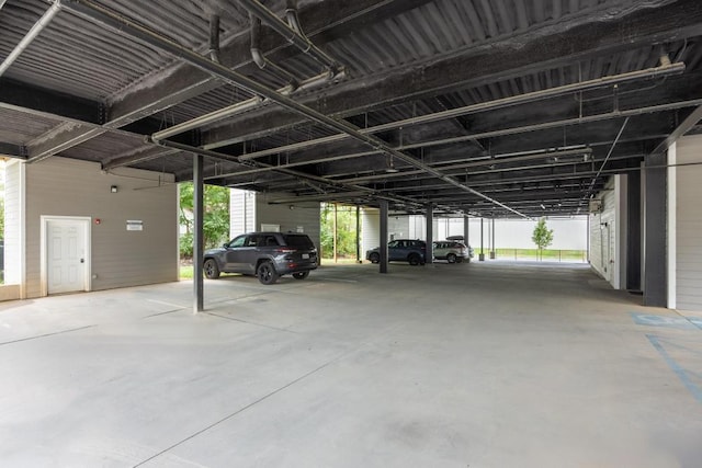 garage featuring a carport