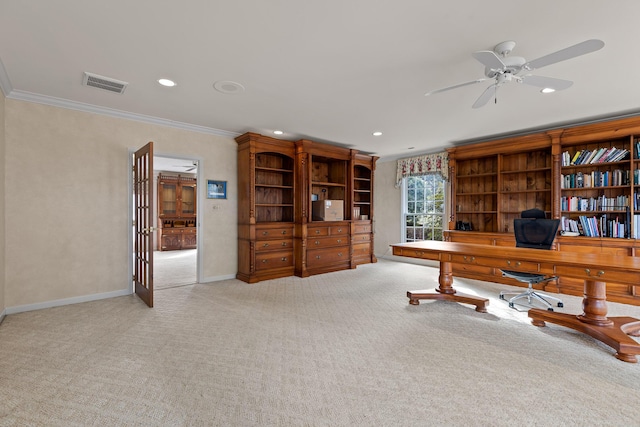 office space with light carpet, ceiling fan, and crown molding