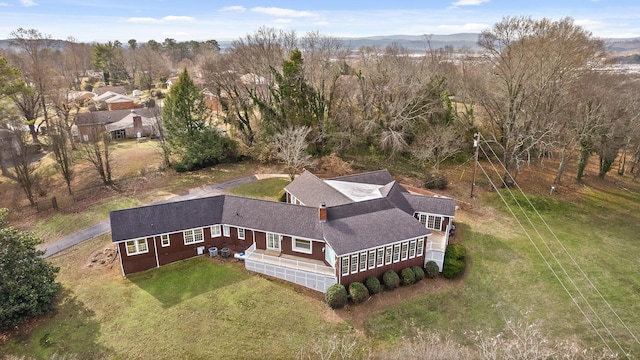 birds eye view of property with a mountain view