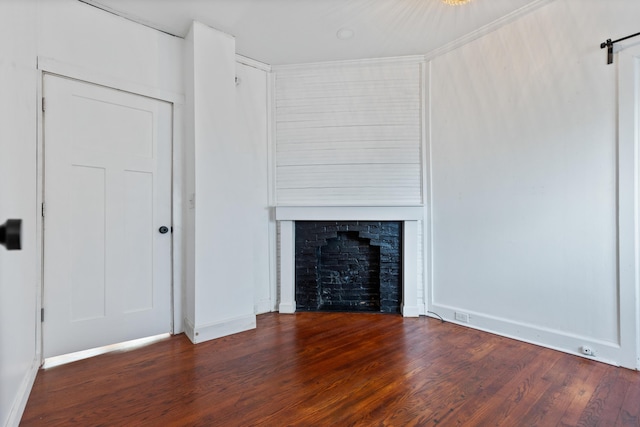 unfurnished living room featuring dark hardwood / wood-style flooring and a fireplace