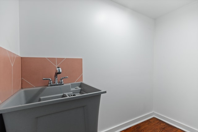 interior space featuring hardwood / wood-style flooring and sink