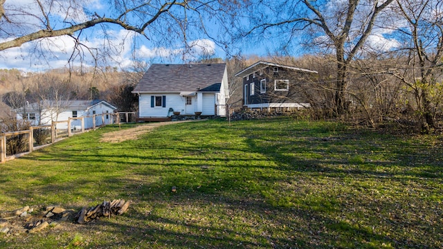 view of front of home featuring a front lawn