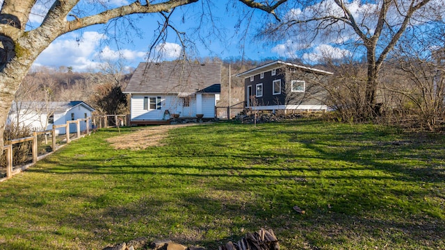 ranch-style home with a front yard