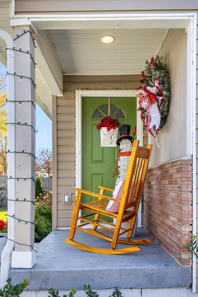 doorway to property featuring a porch