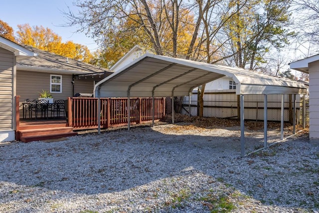 view of vehicle parking featuring a carport