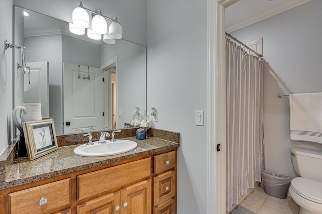 bathroom with vanity, a shower with curtain, crown molding, tile patterned flooring, and toilet