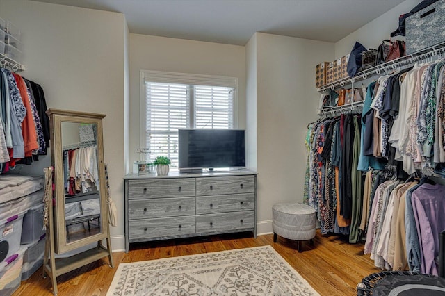 walk in closet featuring light wood-type flooring