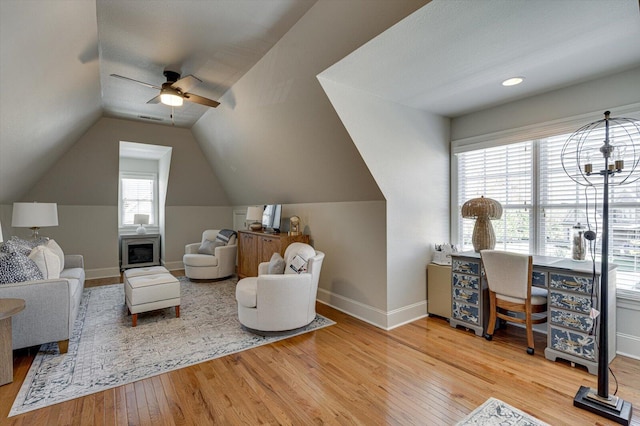 office with hardwood / wood-style flooring, ceiling fan, and lofted ceiling