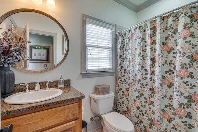 bathroom featuring walk in shower, toilet, vanity, and ornamental molding