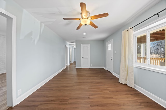 hallway with dark wood-type flooring