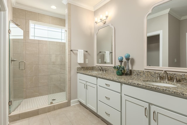 bathroom featuring tile patterned floors, crown molding, vanity, and walk in shower