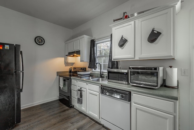 kitchen with sink, white cabinets, black appliances, and dark hardwood / wood-style floors