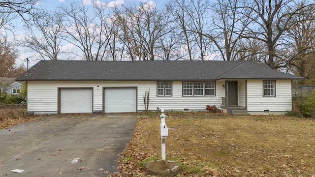 single story home featuring a garage