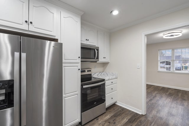 kitchen featuring light stone countertops, appliances with stainless steel finishes, dark wood-type flooring, crown molding, and white cabinetry