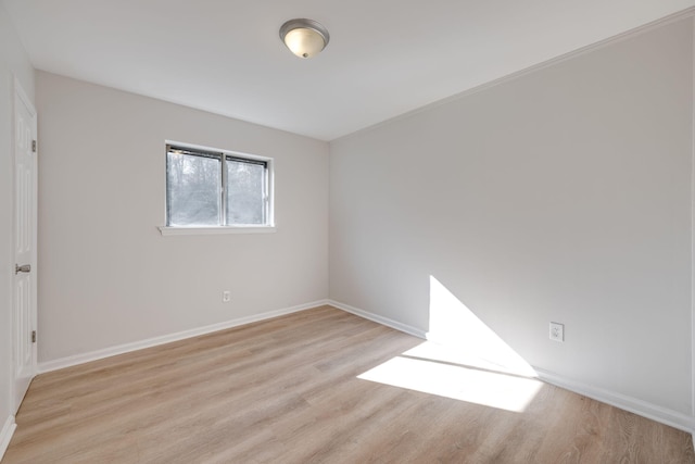 empty room with light wood-type flooring