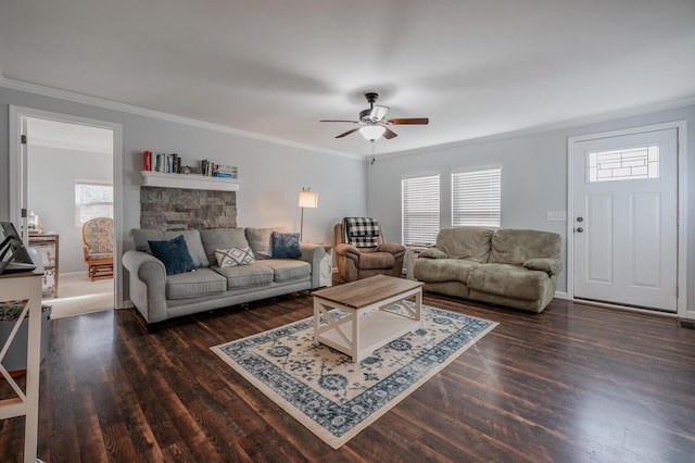 living room featuring dark hardwood / wood-style floors, ceiling fan, and ornamental molding