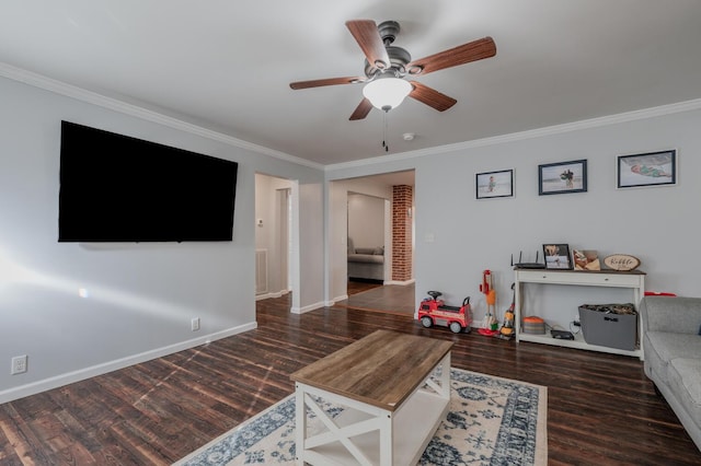 living room with crown molding, ceiling fan, and dark hardwood / wood-style floors