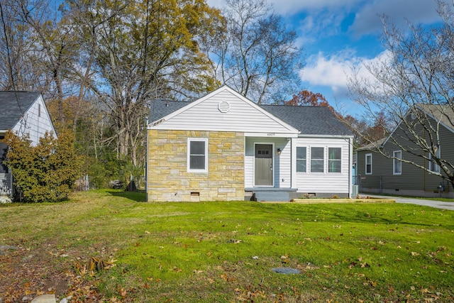 bungalow with a front lawn