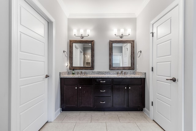 bathroom featuring tile patterned flooring, vanity, and ornamental molding