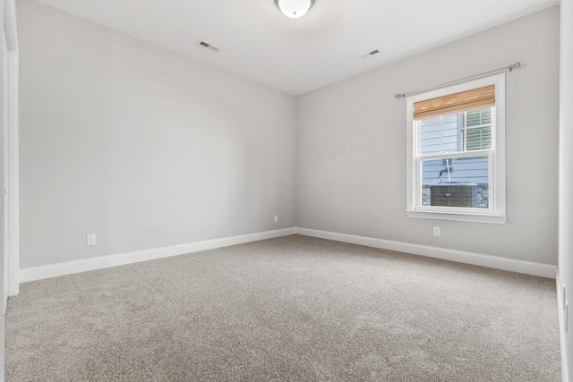 empty room with carpet floors