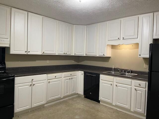 kitchen with white cabinetry, sink, a textured ceiling, and black appliances