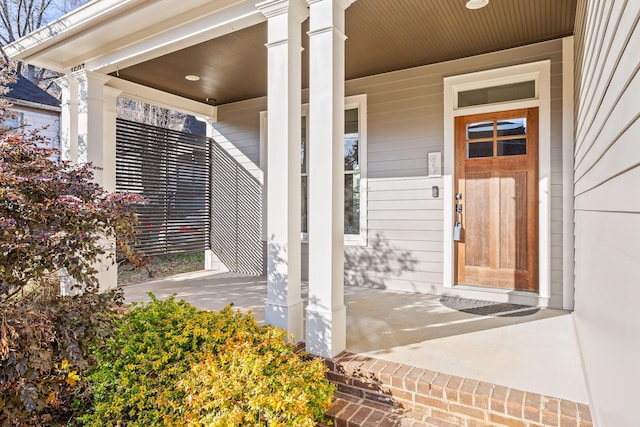 property entrance featuring covered porch