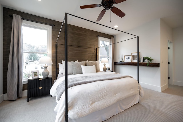 carpeted bedroom with ceiling fan