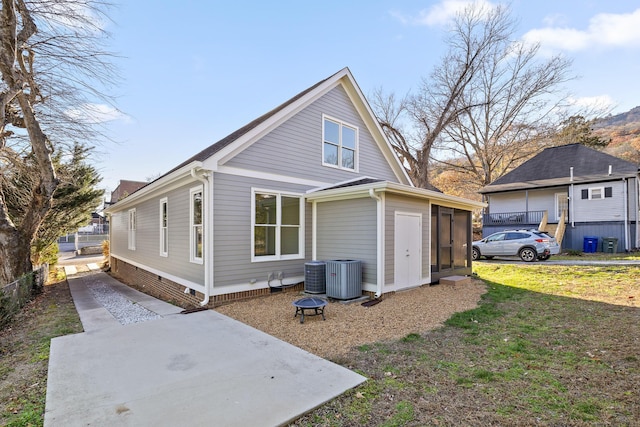 view of home's exterior with a lawn and cooling unit