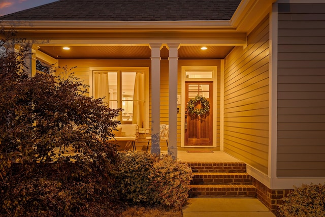 entrance to property with covered porch