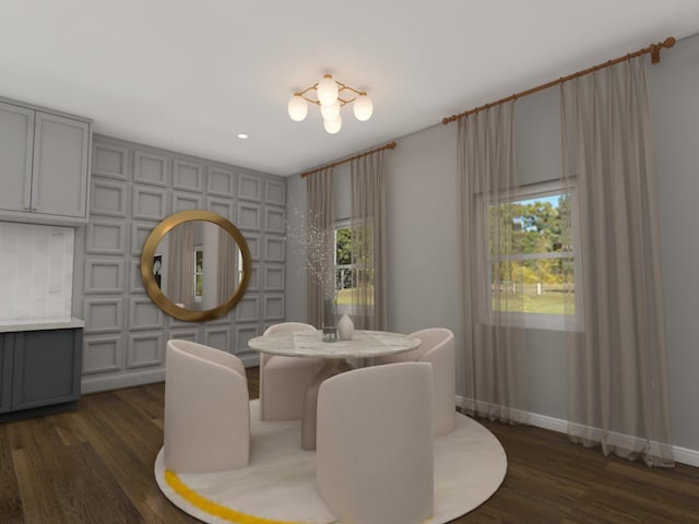 dining area featuring a healthy amount of sunlight and dark hardwood / wood-style floors