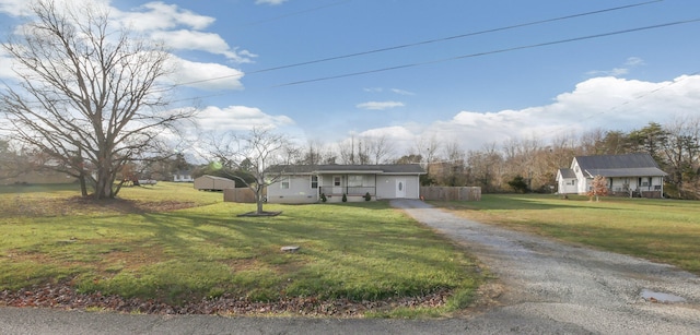 view of front of home featuring a front yard