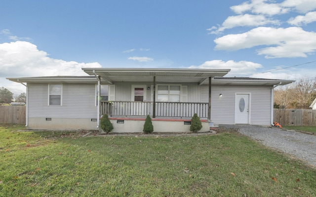 view of front of property with a porch and a front lawn