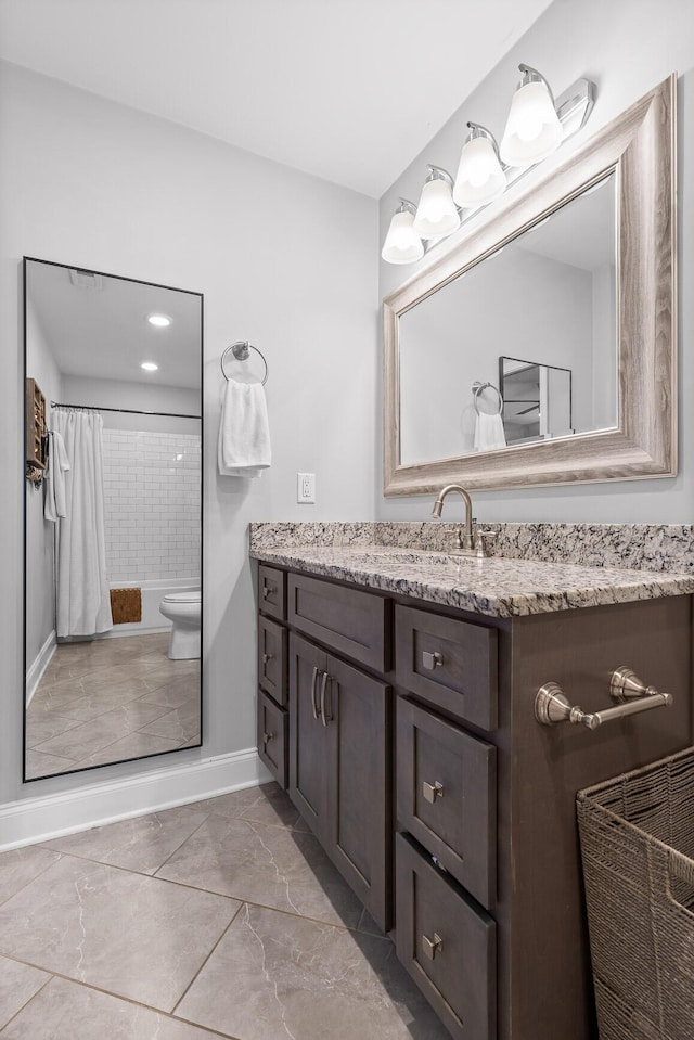 full bathroom with baseboards, toilet, a shower with shower curtain, marble finish floor, and vanity