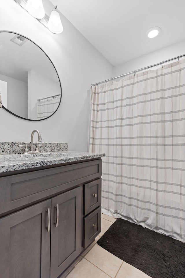 full bath featuring visible vents, a shower with curtain, vanity, and tile patterned flooring