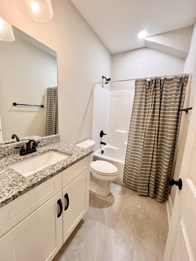 full bathroom featuring vanity, toilet, and shower / tub combo