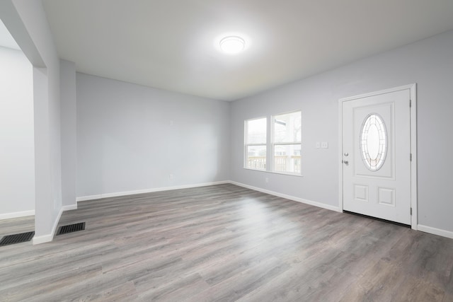 entrance foyer featuring hardwood / wood-style floors