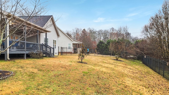 view of yard featuring a wooden deck