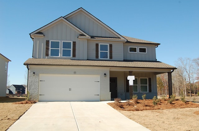 7413 Mcdaniel Ln Unit 23, Ooltewah, TN 37363 - craftsman house featuring board and batten siding, covered porch, a garage, concrete driveway, and roof with shingles