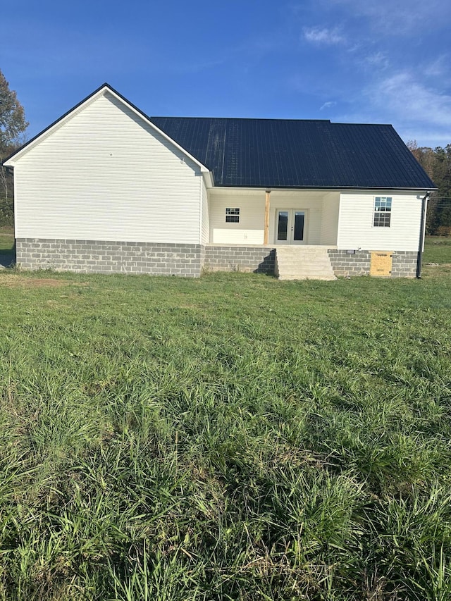 view of home's exterior featuring a yard