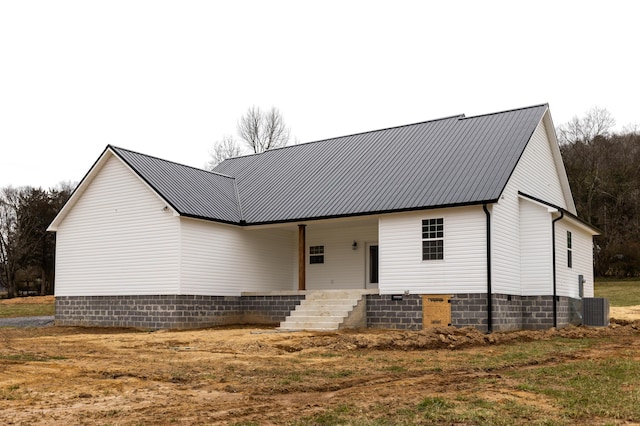 view of front of house with central AC unit