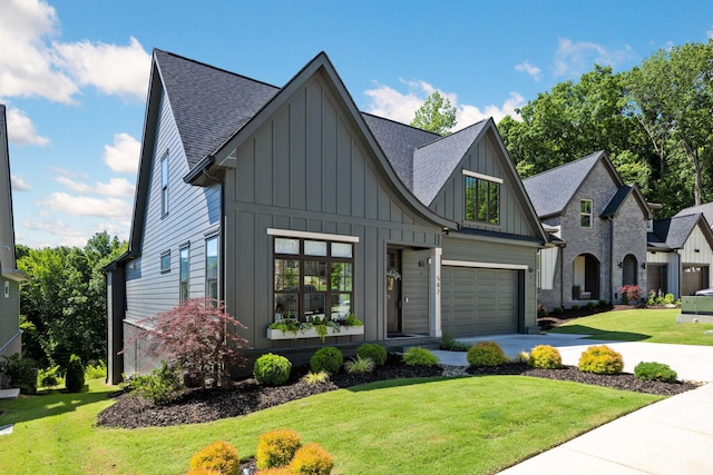 587 Sun Valley Rd, Chattanooga, TN 37419 - view of front of property with a front yard and a garage