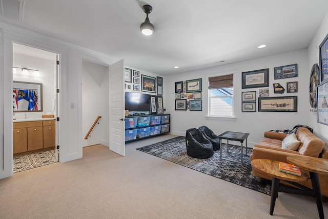 living room featuring light carpet