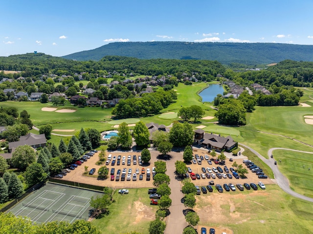 aerial view featuring a water and mountain view