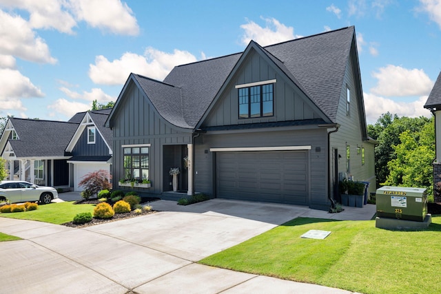 view of front facade with a front lawn and a garage