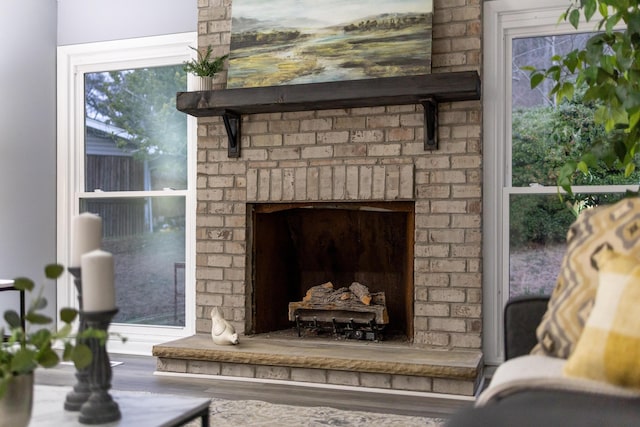 details featuring a brick fireplace