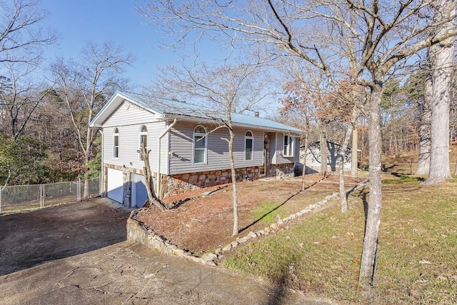 view of front of property featuring a garage